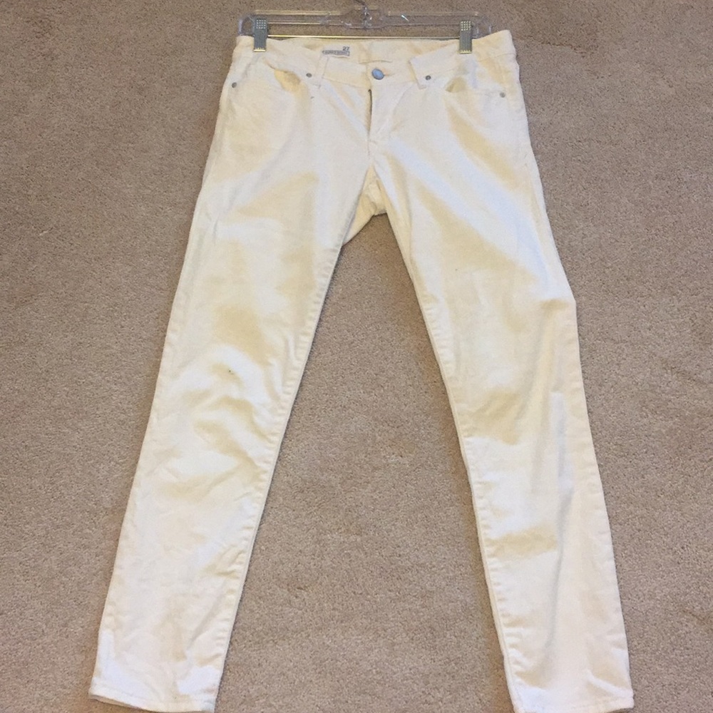 White denim skinny jeans.